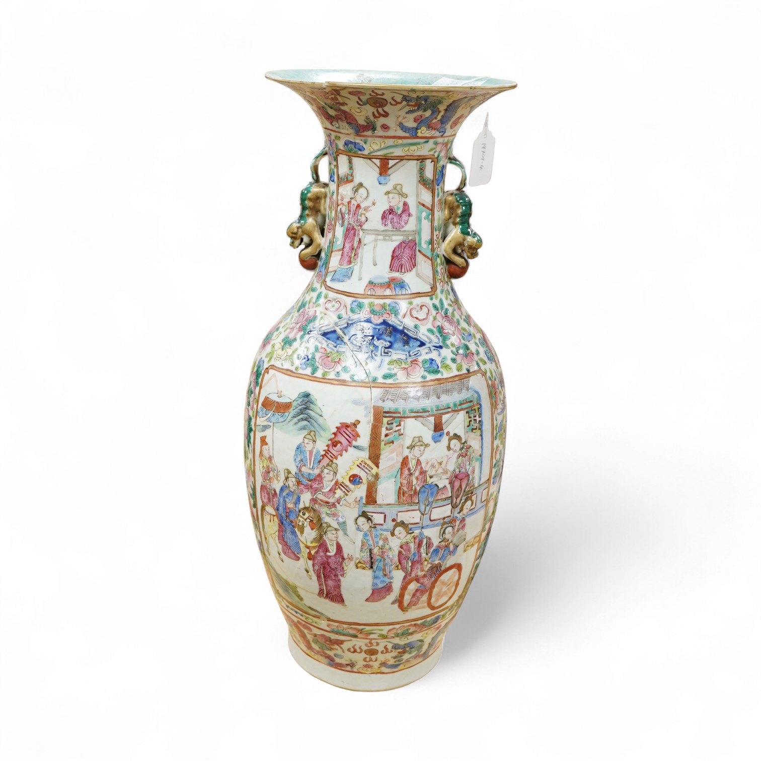 A large Chinese famille rose vase enamelled with figures and flowers, 59cm high (damaged and repaired)